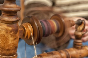 close-up of spinning on antique wheel